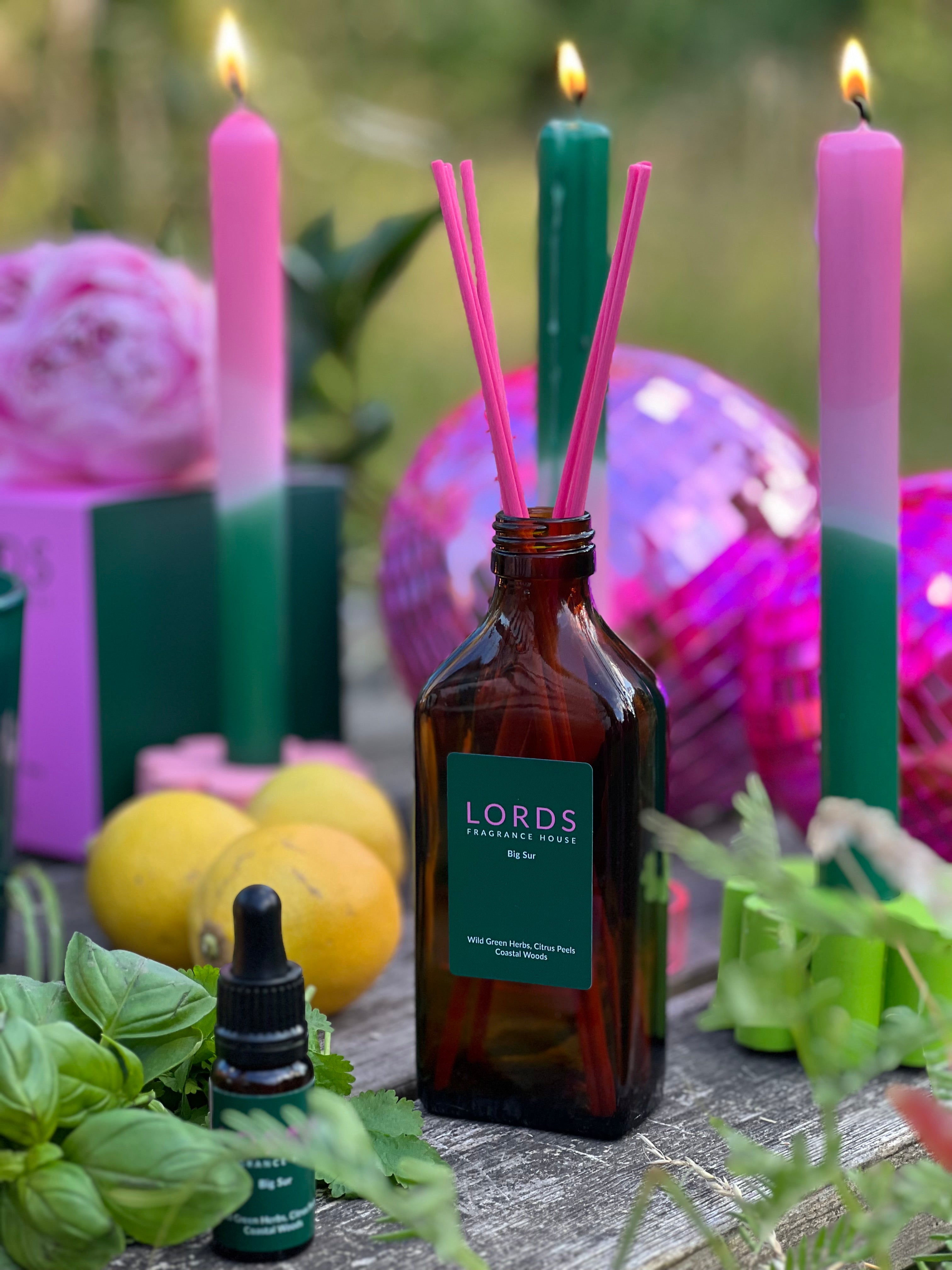 Big Sur reed diffuser, brown bottle, pink sticks, green label 
